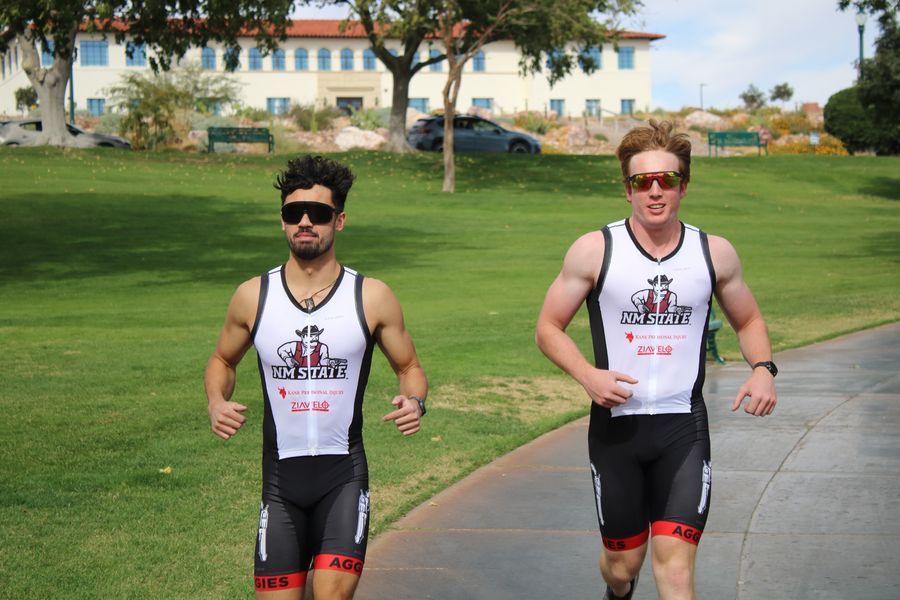 Colin and Philip running to the finish line at the Pumpkinman Triathlon
